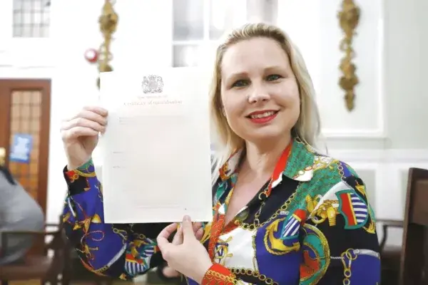 Teacher Gra with her Cambridge CELTA certificate